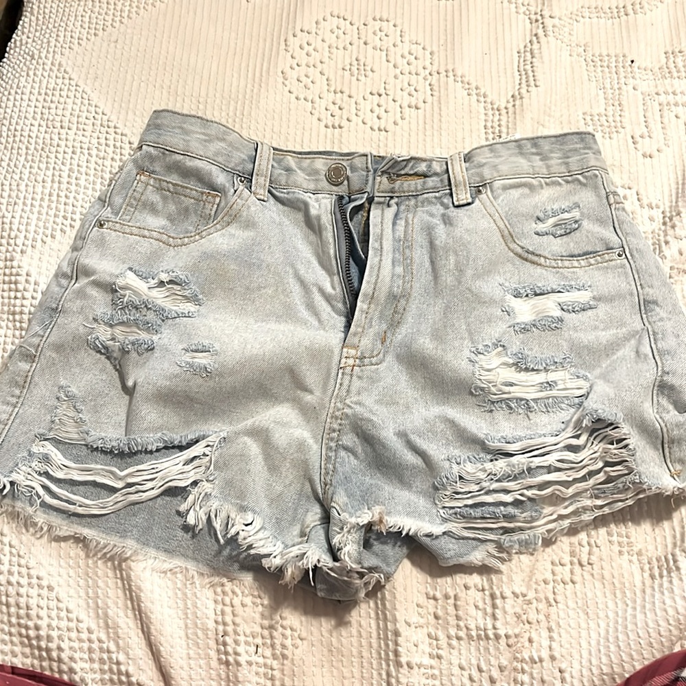 light wash ripped jean shorts